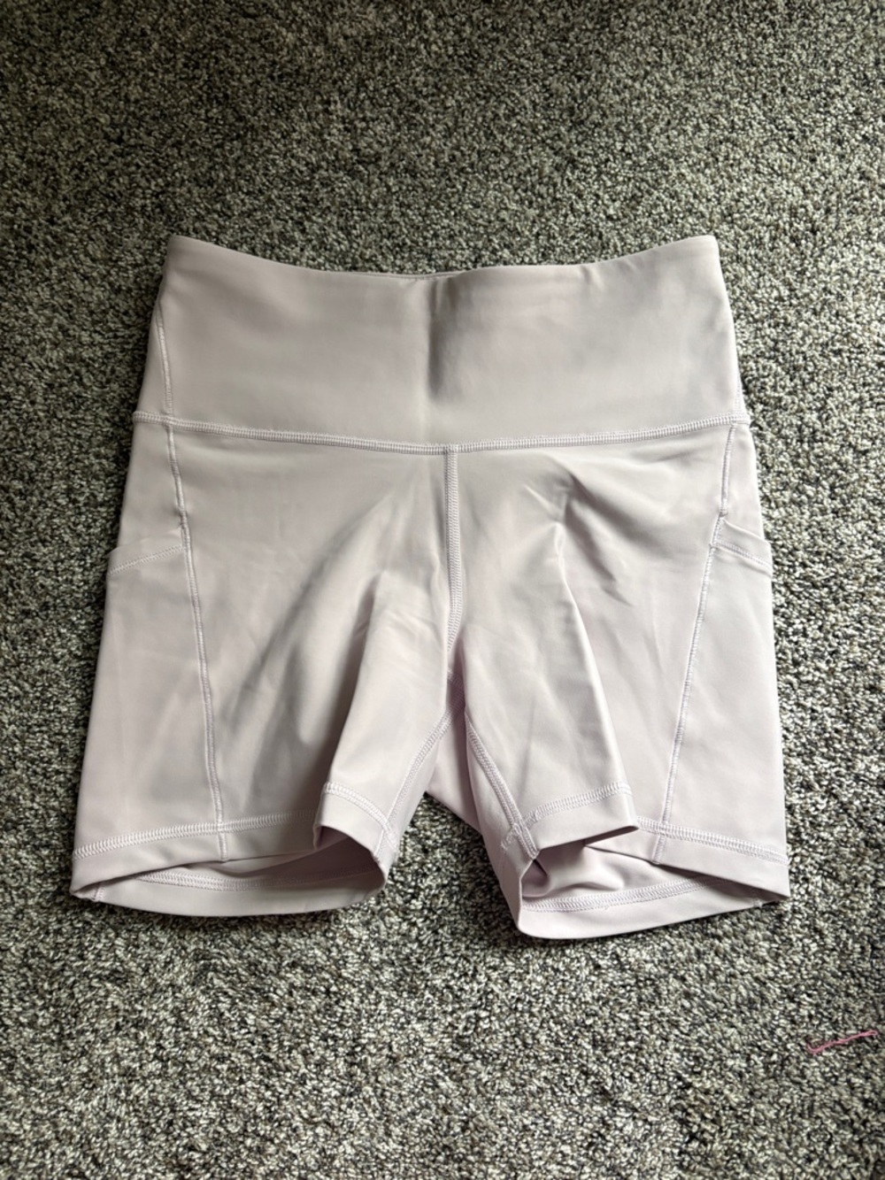 Athleta light pink biker shorts with pockets